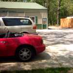 Car at pole barn